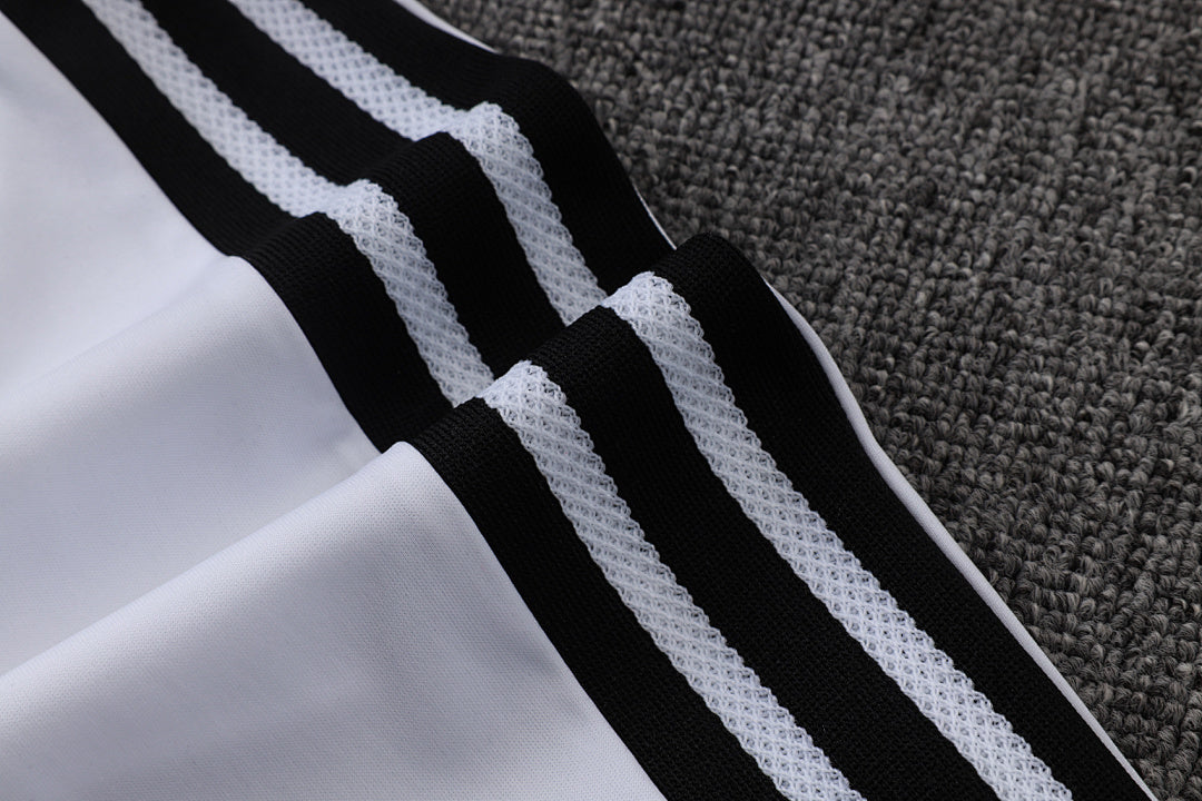 Tuta Real Madrid Bianco/Nero Half-Zip 26/27 Uomo | Tuta da Calcio