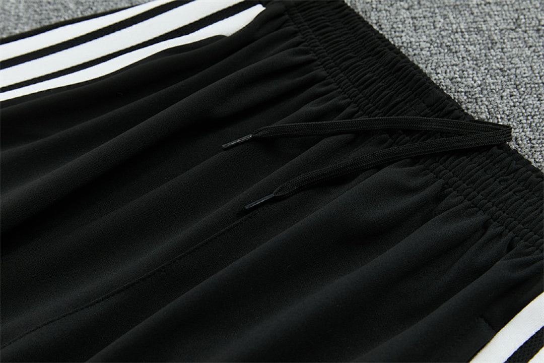 Tuta Germania Rosso/Nero 2026 | Tuta da Calcio