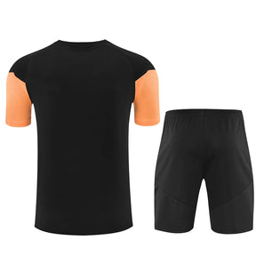 Completino Manica Corta Arsenal 26/27 Uomo Nero e Arancione | Kit Allenamento