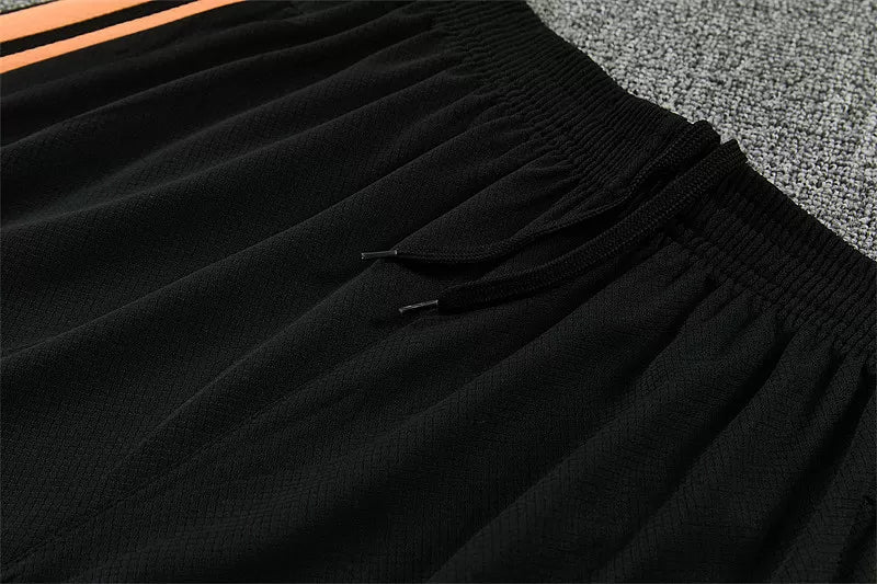 Completino Manica Corta Arsenal 26/27 Uomo Nero e Arancione | Kit Allenamento