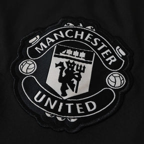 Giacca a Vento Manchester United 26/27 Uomo Nero e Rosso | Giacca a Vento da Calcio