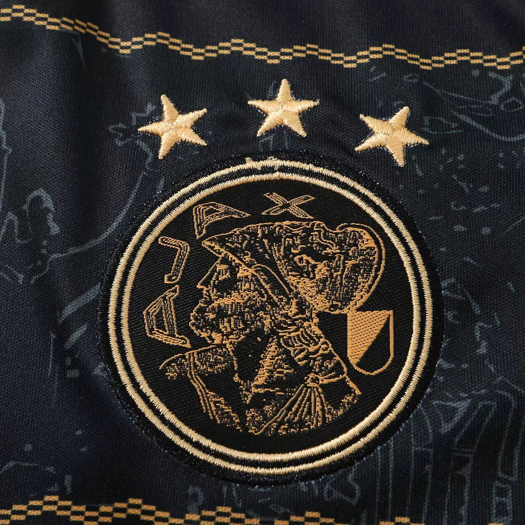 Kit Bambino Ajax Away 26/27 Nero con dettagli oro | Kit da Calcio
