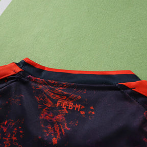 Kit Bambino Bayern Munich Third 26/27 Nero con dettagli Rosso Arancione | Kit da Calcio