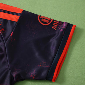 Kit Bambino Bayern Munich Third 26/27 Nero con dettagli Rosso Arancione | Kit da Calcio