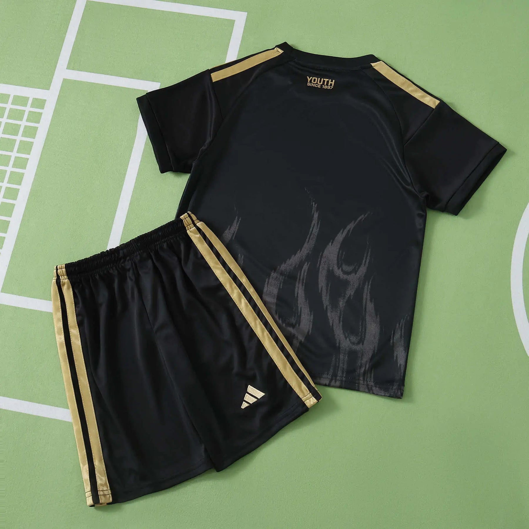 Kit Bambino Third 26/27 Nero con dettagli oro | Kit da Calcio