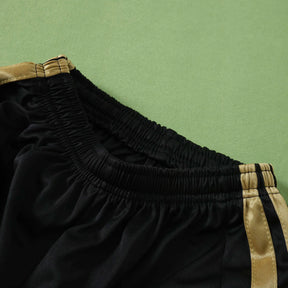 Kit Bambino Third 26/27 Nero con dettagli oro | Kit da Calcio
