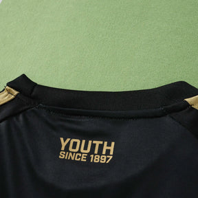 Kit Bambino Third 26/27 Nero con dettagli oro | Kit da Calcio