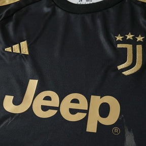 Kit Bambino Third 26/27 Nero con dettagli oro | Kit da Calcio