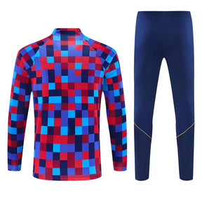 Tuta Barcelona 26/27 Uomo Blu Navy con motivo pixelato rosso, blu e azzurro | Maglia da Calcio