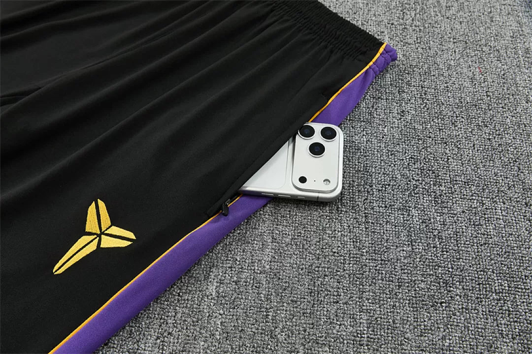 Tuta Barcelona 26/27 Uomo Nero con dettagli Viola e Giallo | Maglia da Calcio