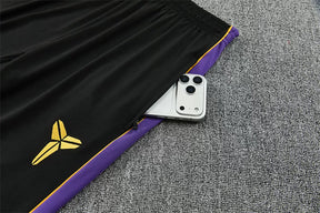 Tuta Barcelona 26/27 Uomo Nero con dettagli Viola e Giallo | Maglia da Calcio