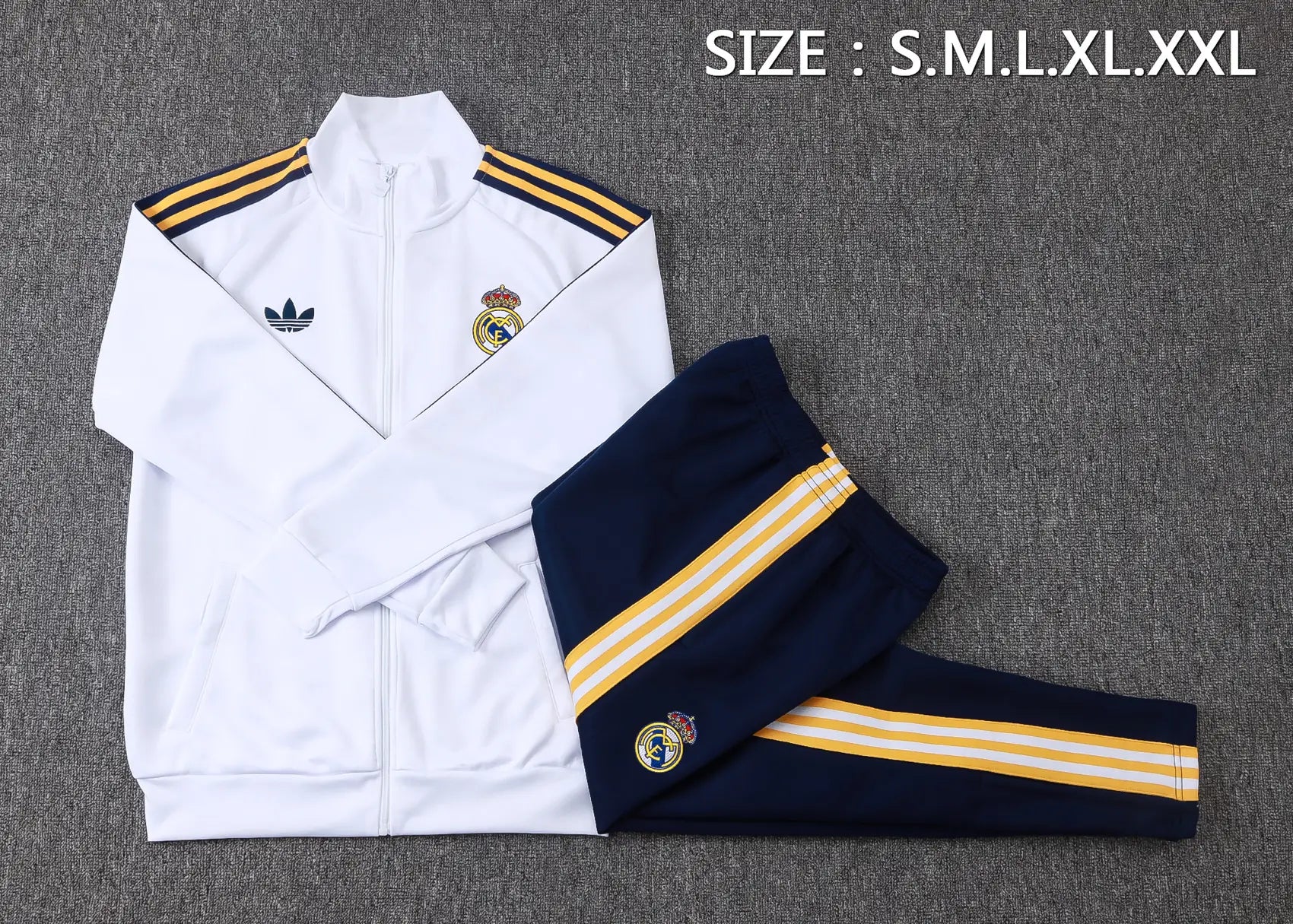 Tuta Full-zip Real Madrid 26/27 Uomo Bianco e Blu Navy | Tuta da Calcio
