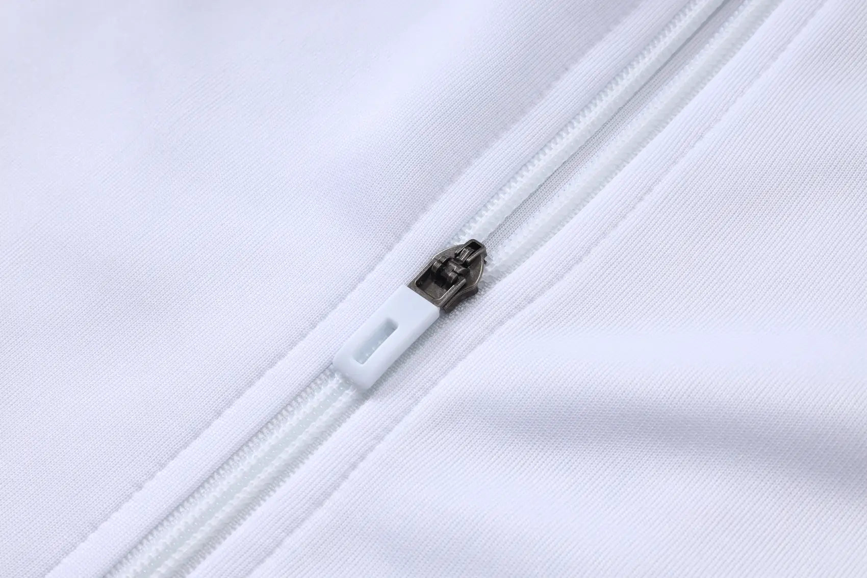Tuta Full-zip Real Madrid 26/27 Uomo Bianco e Verde Petrolio | Tuta da Calcio