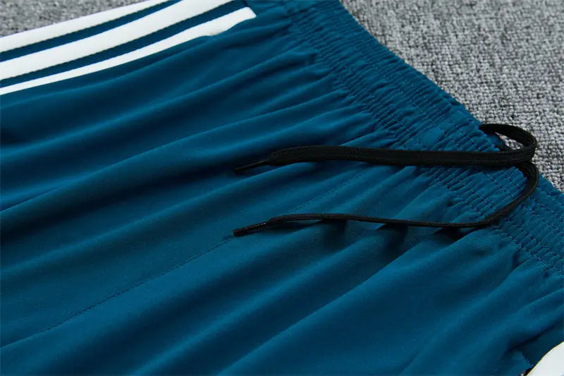 Tuta Half-zip Arsenal 26/27 Uomo Blu Navy con dettagli Rosso e Azzurro | Tuta da Calcio