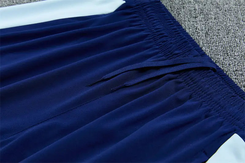 Tuta Half-zip Manchester City 26/27 Uomo Azzurro e Blu Navy | Tuta da Calcio