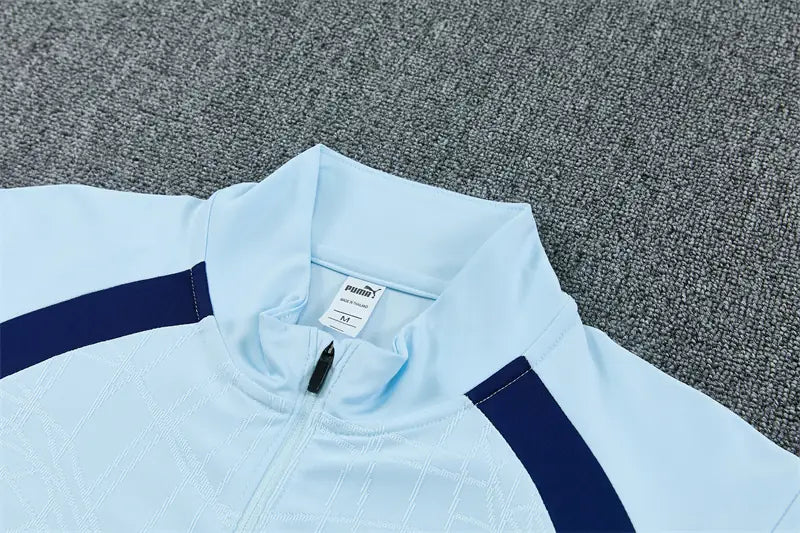 Tuta Half-zip Manchester City 26/27 Uomo Azzurro e Blu Navy | Tuta da Calcio