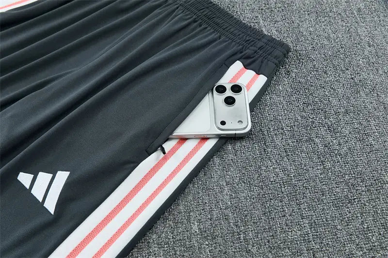 Tuta Half-zip Real Madrid 26/27 Uomo Grigio Antracite e Rosa Corallo | Tuta da Calcio