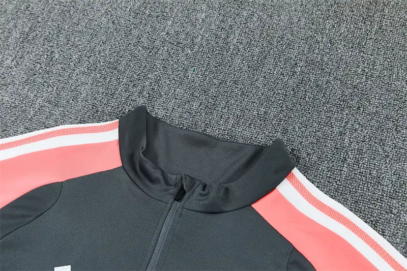 Tuta Half-zip Real Madrid 26/27 Uomo Grigio Antracite e Rosa Corallo | Tuta da Calcio