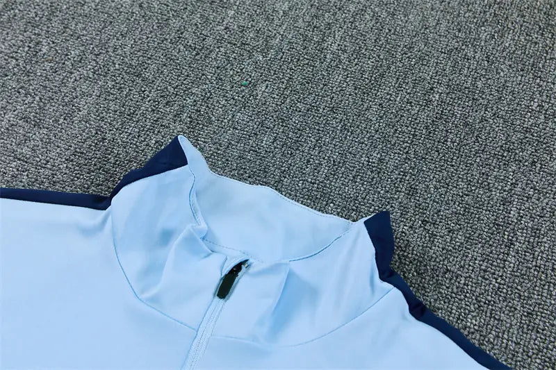 Tuta Half-zip Tottenham 26/27 Uomo Azzurro e Blu Navy | Tuta da Calcio